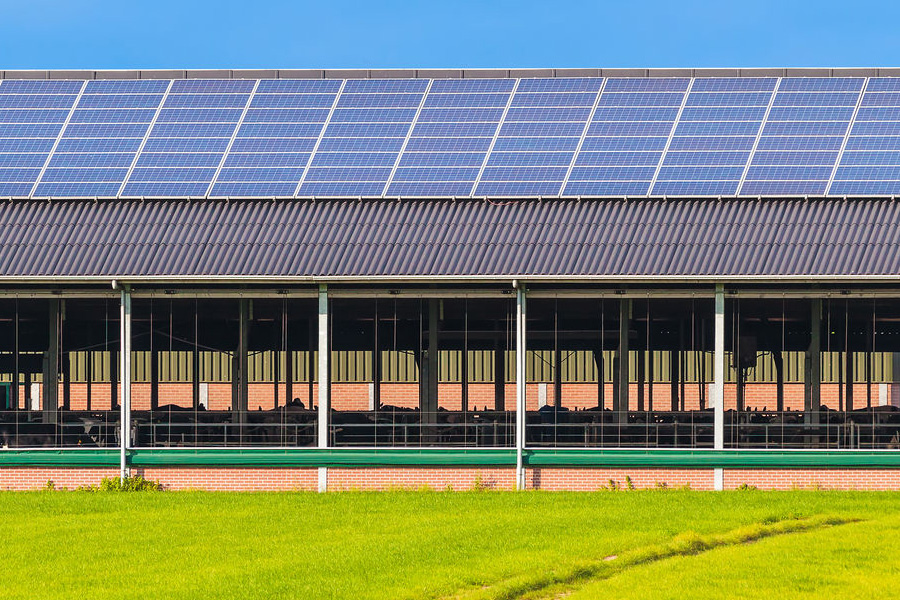 Solar panels on the rooftop of a farm building