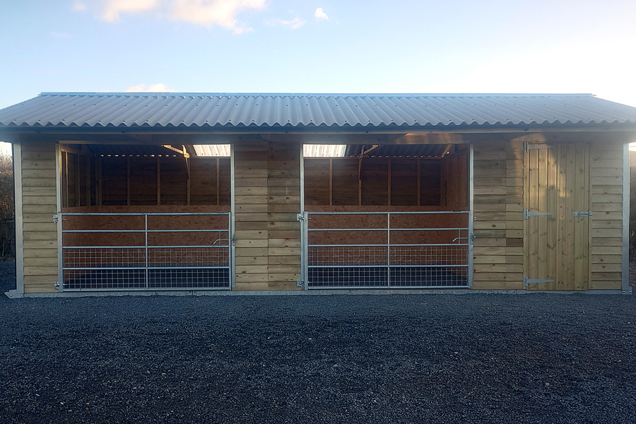 Equestrian hardstanding and shelter that were subject of a development enforcement issue.